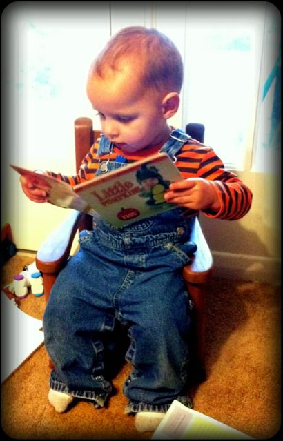 Daniel loves sitting in this little rocking chair and reading. Wonder where he gets that? :-)