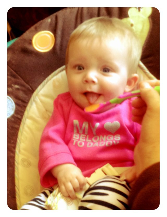 Lily’s first bite of baby food!