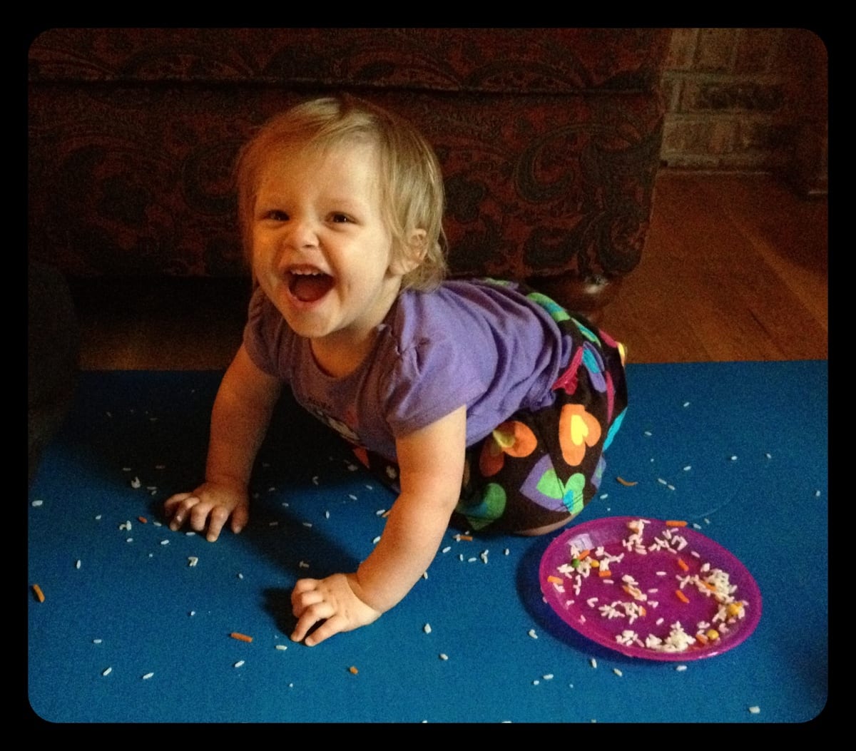 Lily playing in her food