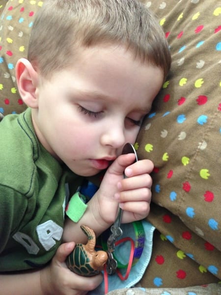 A silver spoon and a turtle… Kids are so precious when they sleep!
