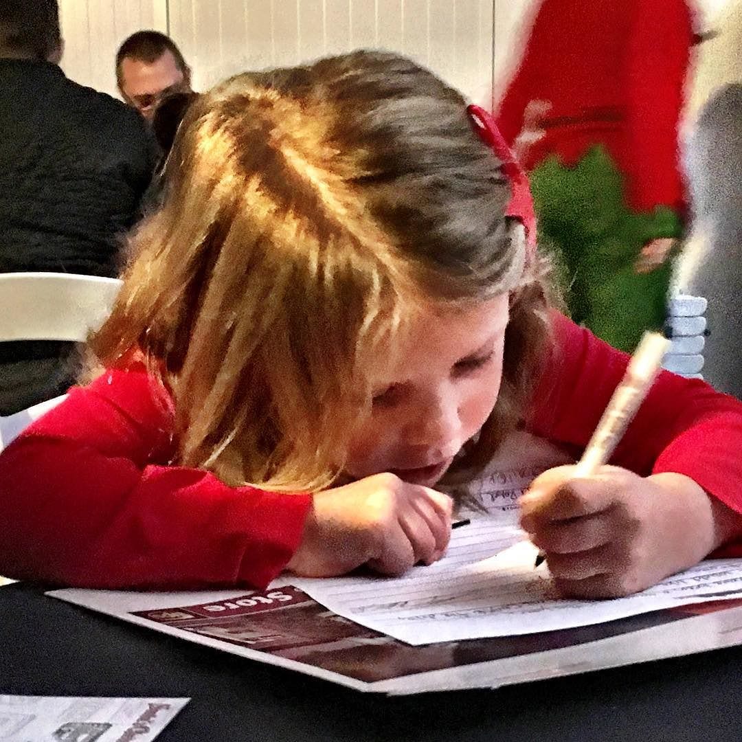 Lily writing her note to Santa… Very focused…